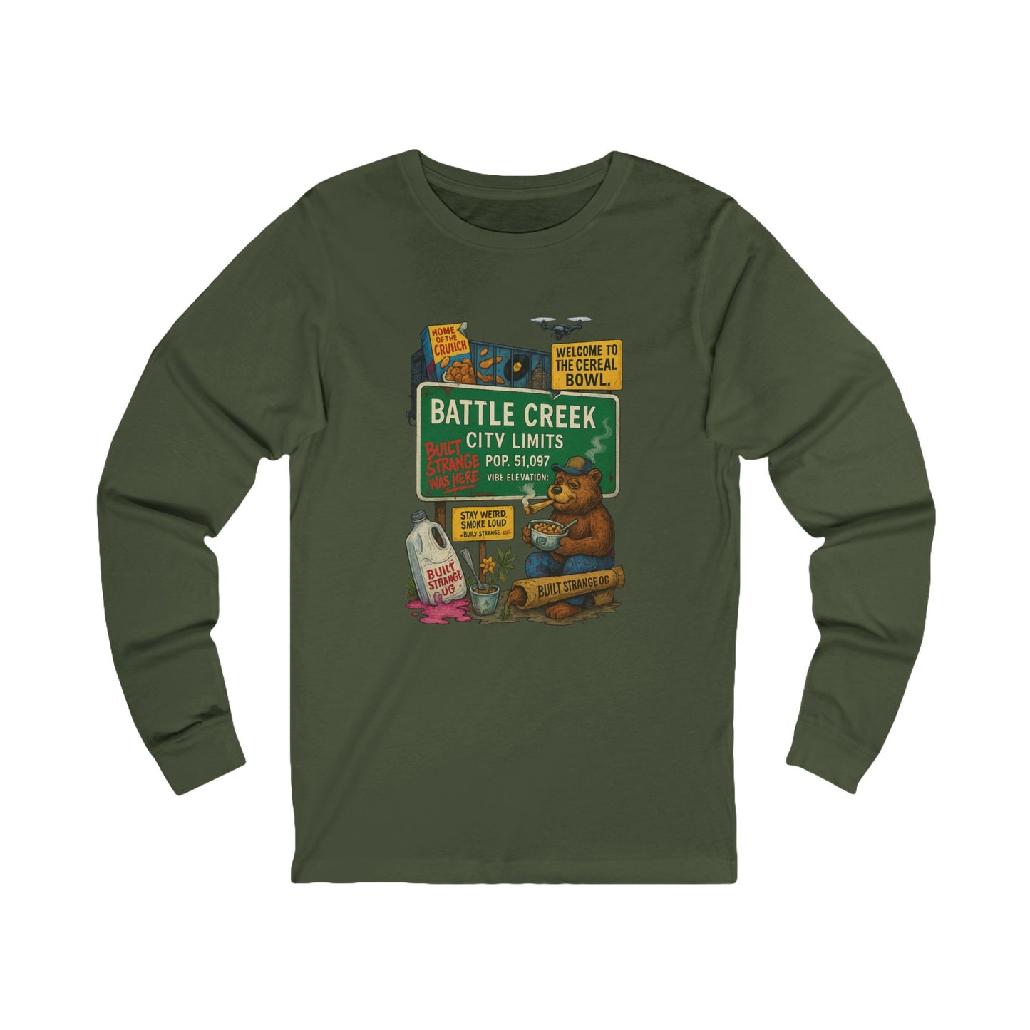 Pour up the crunch and light one up — the Battle Creek “Built Strange Was Here” long sleeve tee celebrates the cereal capital in true Built Strange fashion. Featuring the iconic bear kicking back with a bowl and a smoke, this design mixes nostalgia, humor, and that unmistakable Midwest chill.
Premium jersey long sleeve tee
Soft, breathable cotton with a relaxed fit
Full-color front print with vivid detail
Perfect for laid-back days or layered looks
Designed by Built Strange Apparel