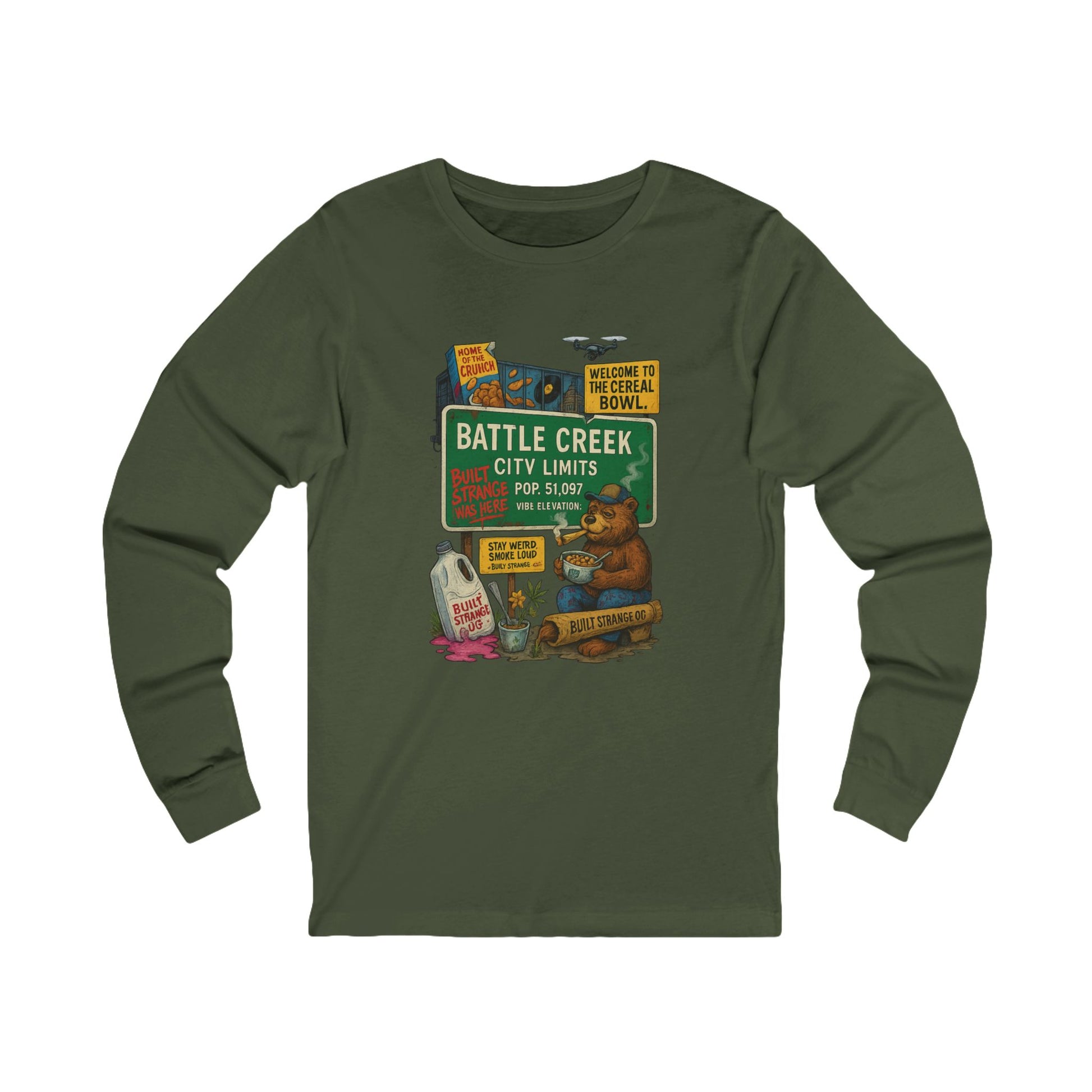 Pour up the crunch and light one up — the Battle Creek “Built Strange Was Here” long sleeve tee celebrates the cereal capital in true Built Strange fashion. Featuring the iconic bear kicking back with a bowl and a smoke, this design mixes nostalgia, humor, and that unmistakable Midwest chill.
Premium jersey long sleeve tee
Soft, breathable cotton with a relaxed fit
Full-color front print with vivid detail
Perfect for laid-back days or layered looks
Designed by Built Strange Apparel