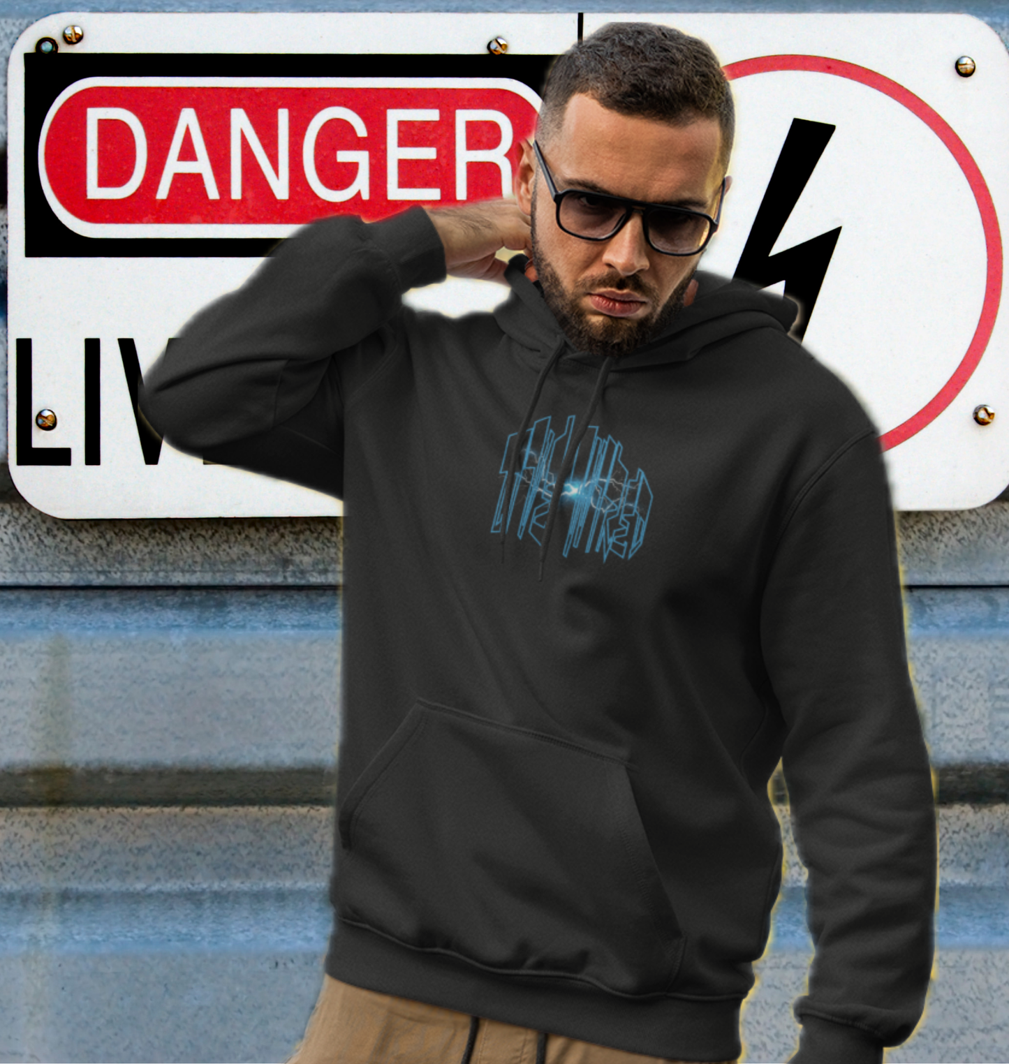 High voltage style built for the bold.
Front: “Live Wired” lightning hands graphic – raw energy captured in motion.
Back: Storm Mask design – battle-ready helmet cracked with electric bolts.
Premium fleece hoodie with a tough, streetwear-meets-tradewear aesthetic.
Designed for those who power through storms, grind in the trades, and live life charged up.
This drop from the Built Strange 24 Series fuses blue-collar grit with urban edge. From the jobsite to the block, it’s shockproof style.