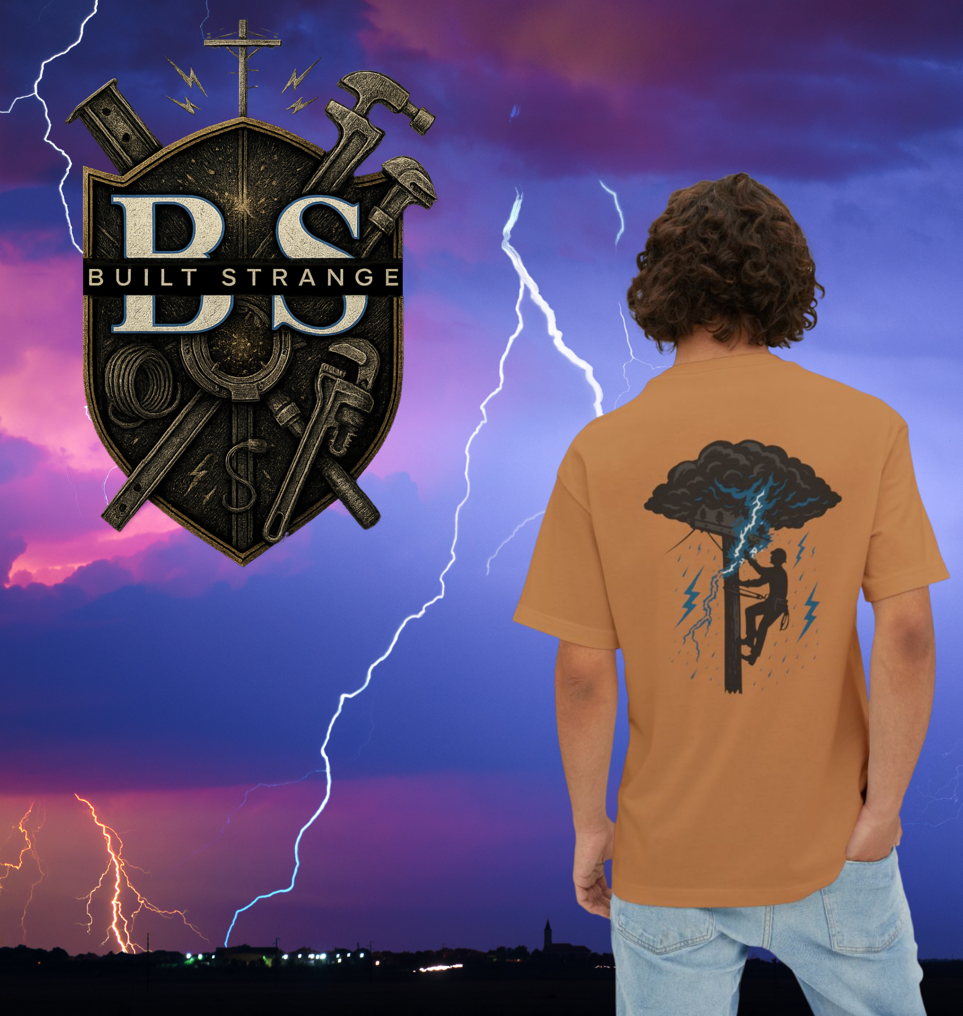 Power in the storm. This bold Built Strange tradewear design captures the grit and courage of the lineworker climbing into lightning and rain to keep the world lit.