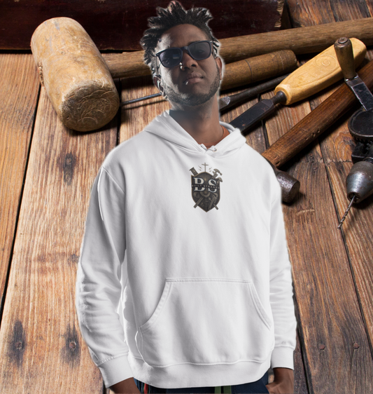 Step onto the jobsite or the street in true carpenter pride.
This Built Strange hoodie features:

Front: Bold Built Strange Trades crest logo on the chest.

Back: Full “Working Class Carpenter” design – crossed hammers, saw blade, laurel wreath, and chain badge, built tough for the BS 24 Series.

Midweight fleece for all-season comfort.

Streetwear edge + tradewear grit = everyday armor.

Made for union brothers, blue-collar grinders, and anyone repping the trades with pride.